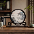 Load image into Gallery viewer, Round double-sided embroidery on carved rosewood stand depicting Chinese mountain landscape with pine trees, red sun, and river boats on silk