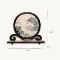 Load image into Gallery viewer, Round double-sided embroidery on carved rosewood stand depicting Chinese mountain landscape with pine trees, red sun, and river boats on silk
