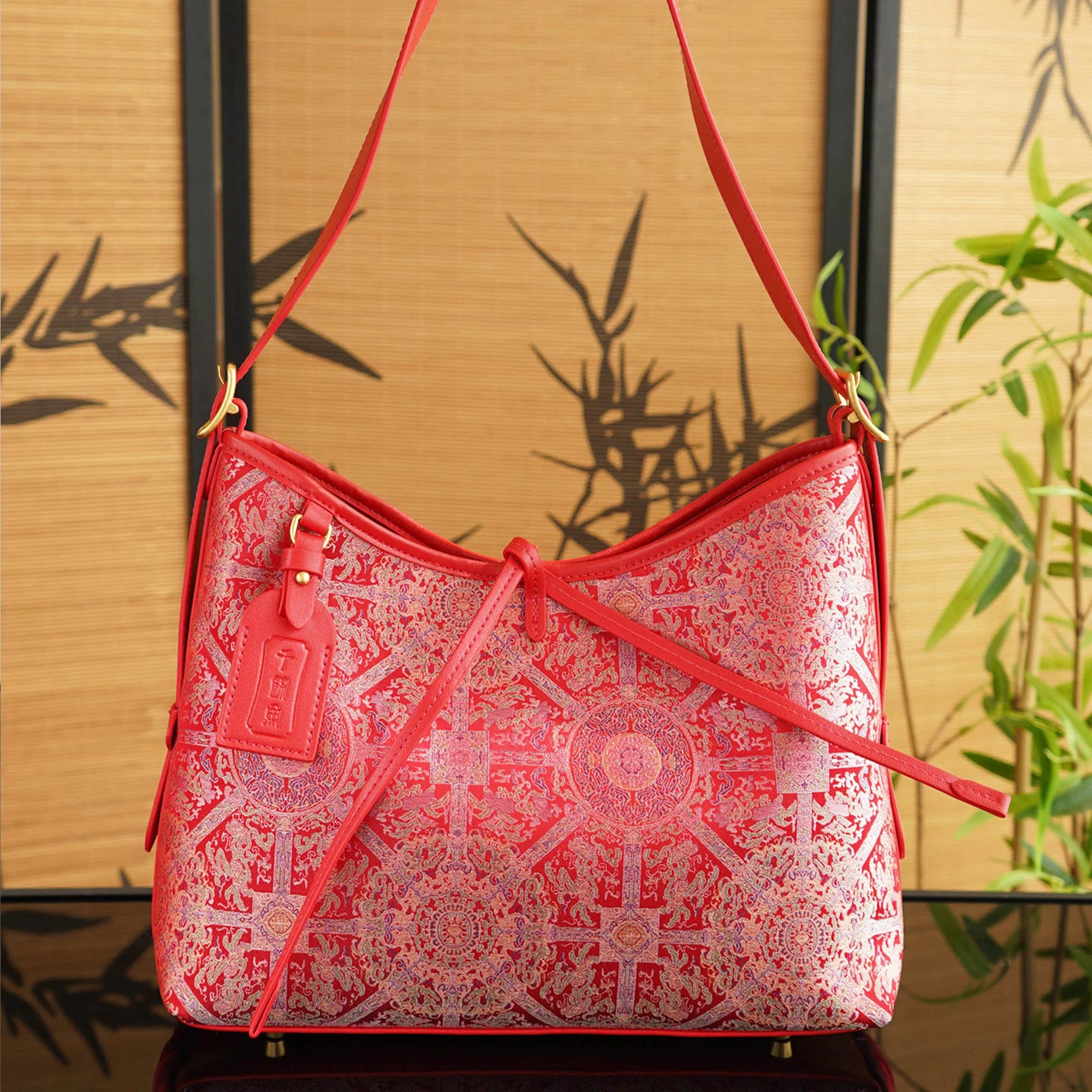 SinoCrafted red Bada Halo Song brocade shoulder bag with genuine leather trim and strap