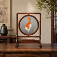 Load image into Gallery viewer, Reverse side of double-sided embroidery featuring orange and white cat in same playful pose with grasshopper on gray silk
