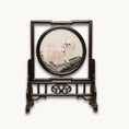 Load image into Gallery viewer, Reverse side of double-sided embroidery showing two fluffy white Pekingese dogs together in a circular silk frame on a carved wooden stand

