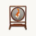 Load image into Gallery viewer, Reverse side of double-sided embroidery featuring orange and white cat in same playful pose with grasshopper on gray silk
