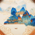 Cargar la imagen en la vista de la galería, Double-sided embroidery of a blue green mountain landscape with clouds and a boat in an octagonal wooden frame
