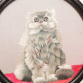 Load image into Gallery viewer, Double-sided embroidery of a fluffy grey cat sitting on a red cushion in a round frame within a rectangular hardwood screen stand with scroll-carved base
