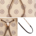 Bild in Galerie-Betrachter laden, Three-panel close-up detail picture of beige genuine leather bucket bag, showcasing exquisite traditional treasure chest Suzhou embroidery texture, vintage Chinese-style round drawstring metal clasp, and mixed gold chain with leather crossbody shoulder strap, presenting fine workmanship and accessory details
