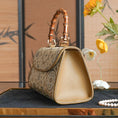 Cargar la imagen en la vista de la galería, SinoCrafted green Crane and Deer Song brocade handbag with genuine leather trim and natural bamboo handle
