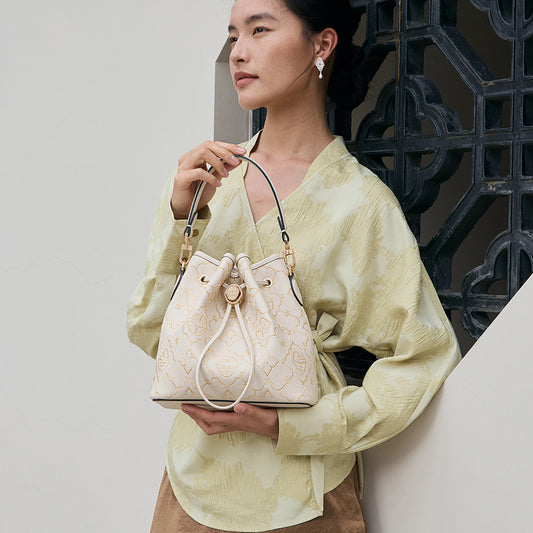 Embroidery Genuine Leather Crossbody Handbag with Oriental Embossed Motif