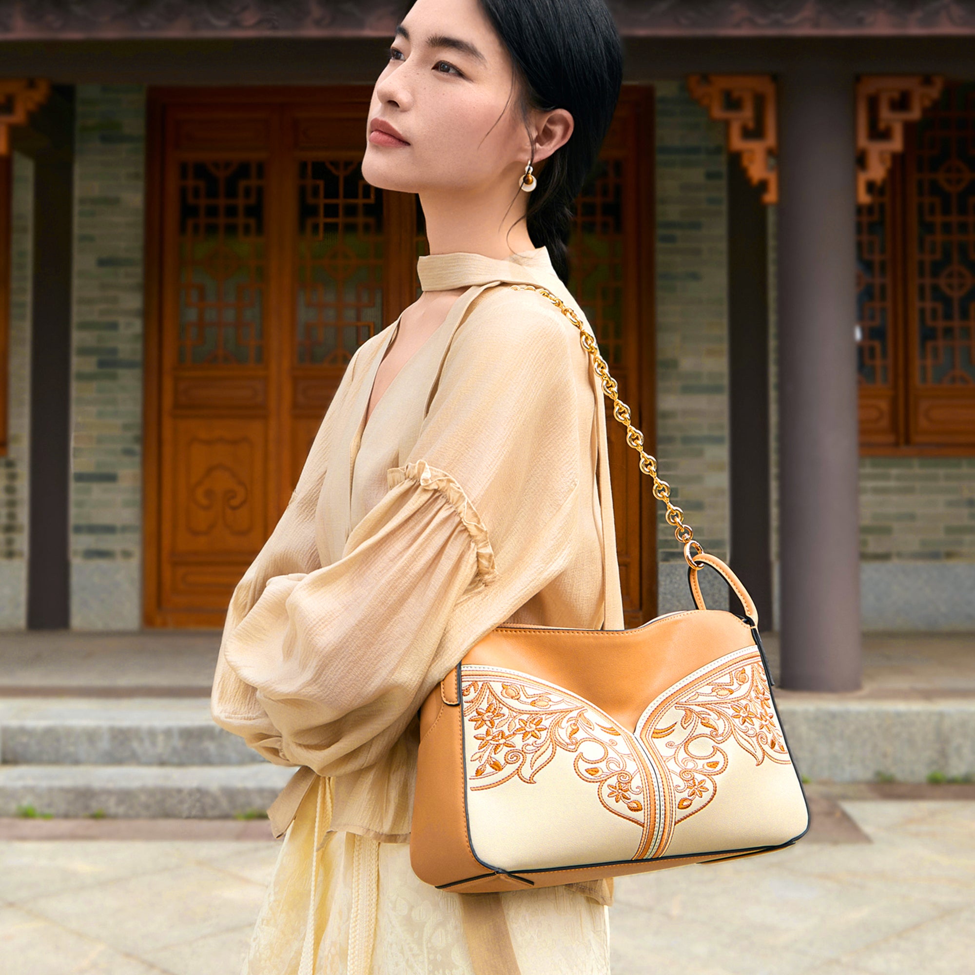 Artisan Hand-Embroidered  Leather Floral Crossbody Bag with Chain Detail
