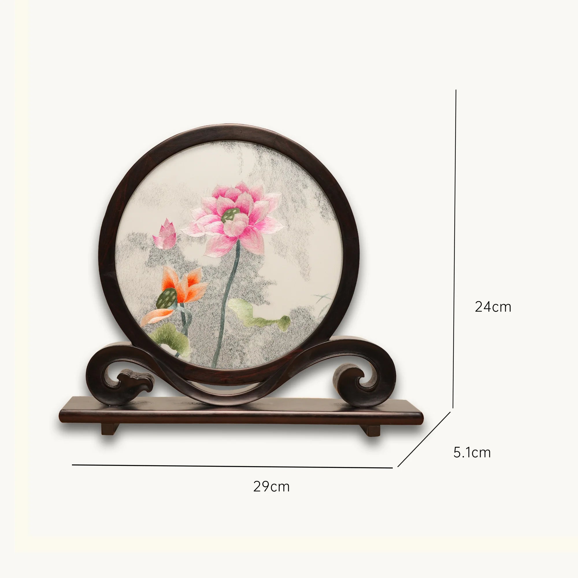 Double-sided embroidery of pink and orange lotus blossoms with green leaves in a round dark hardwood frame on a scroll-carved wooden stand